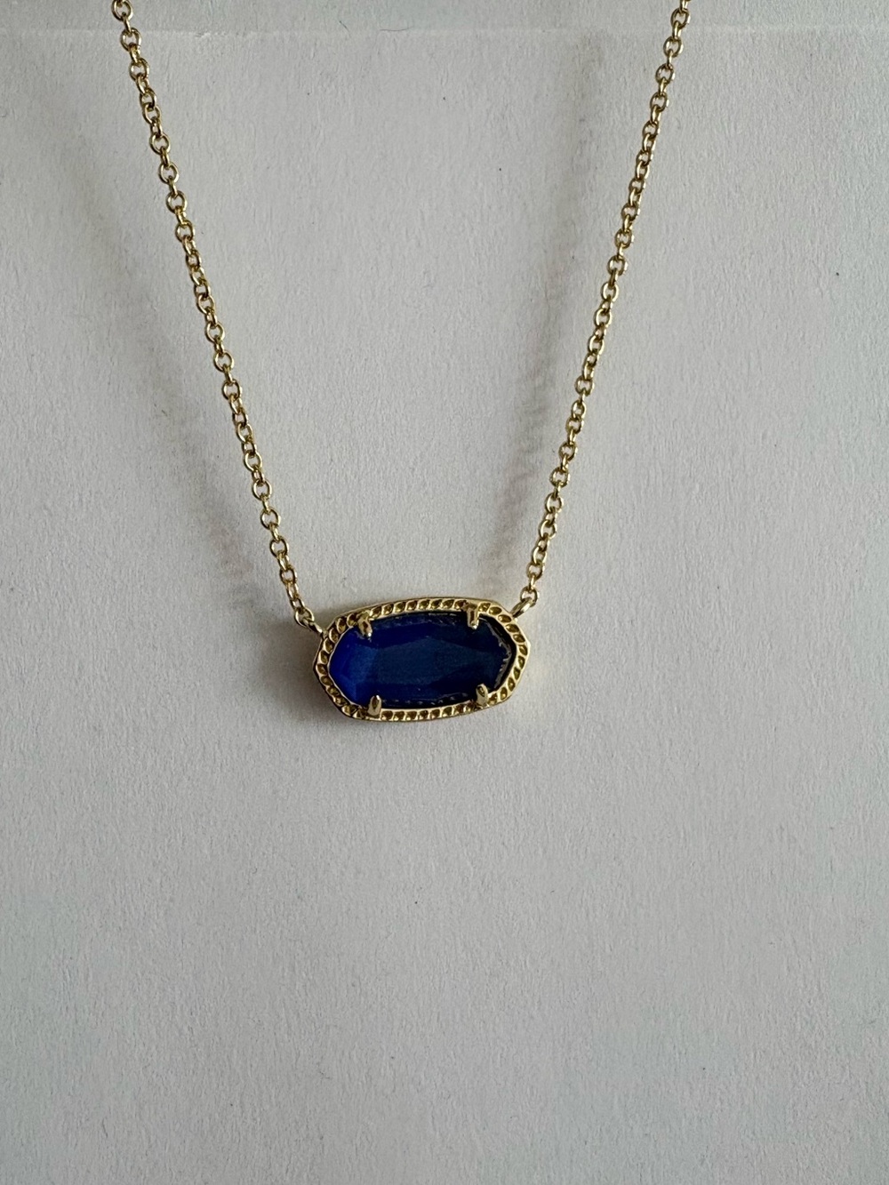 Kendra Scott Gold Chain Necklace with Deep Blue Stone Pendant
